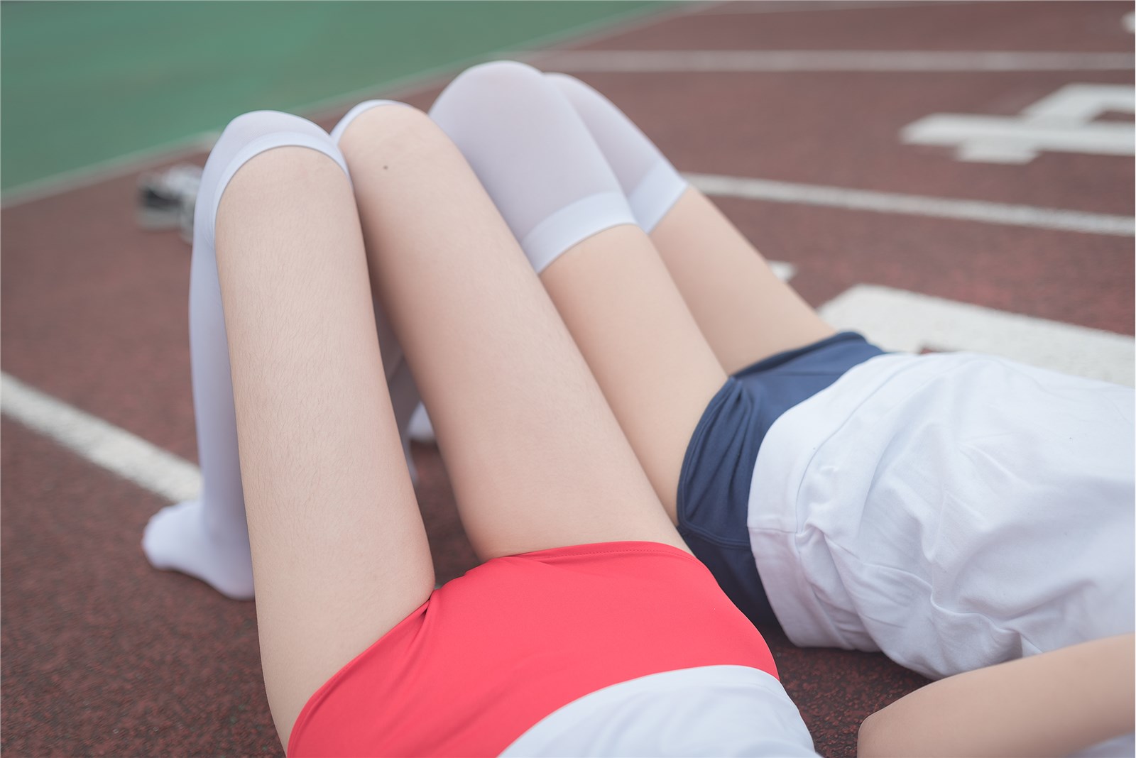 Rabbits play with painted white and gymnastic girls(36)